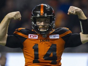 B.C. Lions QB Travis Lulay gestures after a quarterback sneak against the Saskatchewan Roughriders in a CFL game at B.C. Place Stadium in Vancouver on Nov. 5, 2016.