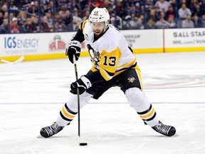 FILE - In this Dec. 22, 2016, file photo, Pittsburgh Penguins&#039; Nick Bonino plays against the Columbus Blue Jackets during an NHL hockey game in Columbus, Ohio. The Western Conference-champion Nashville Predators took care of an area of concern, signing center Nick Bonino away from the Stanley Cup champion Penguins with a $16.4 million, four-year contract on Saturday, July 1, 2017. (AP Photo/Jay LaPrete, File)