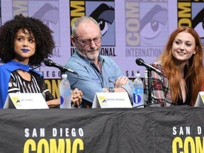 Nathalie Emmanuel, from left, Liam Cunningham, and Sophie Turner attend the &ampquot;Game of Thrones&ampquot; panel on day two of Comic-Con International on Friday, July 21, 2017, in San Diego. (Photo by Al Powers/Invision/AP)