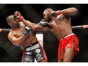 Jon Jones (R) punches Daniel Comier during the UFC 182 event at the MGM Grand Garden Arena on January 3, 2015 in Las Vegas, Nevada. Jones retained his title by unanimous decision.  (Photo by Steve Marcus/Getty Images) ORG XMIT: POS2015010416234197
Steve Marcus, Getty Images