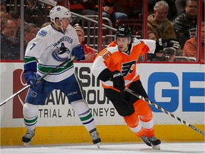 Michael Del Zotto, right, is now a member of the Vancouver Canucks after joining the team in free agency.