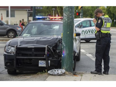 Vancouver police investigate a car crash at 41 and Knight that involves a VPD cruiser, Richmond, July 19 2017.