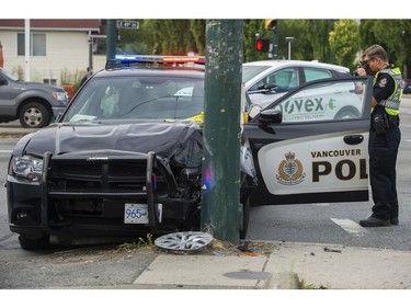 Vancouver police investigate a car crash at 41 and Knight that involves a VPD cruiser, Richmond, July 19 2017.