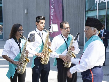 The Ismaili marching band practices outside BC Place in advance of the celebration. Ismaili youth are encouraged to partake in many forms of artistic expression from a young age.