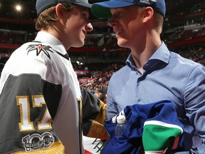 Elias Pettersson (right) is congratulated June 23 after being selected by the Vancouver Canucks in the first round of the NHL Entry Draft.