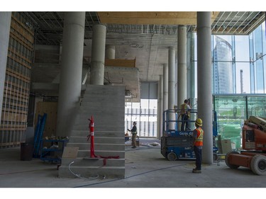 Workers in the lobby of the 55-storey Civic Hotel in Surrey