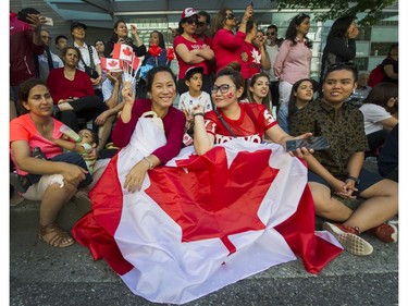 Jessy Phokaew (left) and Nassa Chantacheevakul, both from Thailand, attended the Canada150 parade in Vancouver, B.C., July 2, 2017.