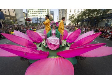 Falun Dafa and thousands of people attended the Canada150 parade in Vancouver, B.C., July 2, 2017.