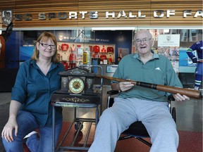 Joanne Johnson and her father Harvey recently donated an 1888 baseball bat and an 1892 clock that belonged to their relative, F.A. Jackson, to the BC Sports Hall of Fame.