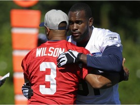 Russell Wilson, Kam Chancellor

Seattle Seahawks quarterback Russell Wilson (3) hugs strong safety Kam Chancellor, right, before an NFL football training camp Monday, July 31, 2017, in Renton, Wash. (AP Photo/Ted S. Warren) ORG XMIT: WATW109
Ted S. Warren, AP