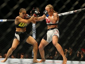 LAS VEGAS, NV - MARCH 5:   Valentina Shevchenko  (R) punches  Amanda Nunes during UFC 196 at the MGM Grand Garden Arena on March 5, 2016 in Las Vegas, Nevada. (Photo by Rey Del Rio/Getty Images)