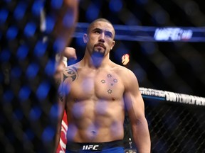 Robert Whittaker stands in the Octagon prior to his interim UFC middleweight championship bout against Yoel Romero during the UFC 213 event at T-Mobile Arena on July 9, 2017 in Las Vegas, Nevada.