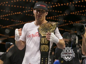 Justin Gaethje celebrates his win over challenger Luis Firmino (not shown) after their World Series of Fighting lightweight championship fight at The Theater at Madison Square Garden on December 31, 2016 in New York City.