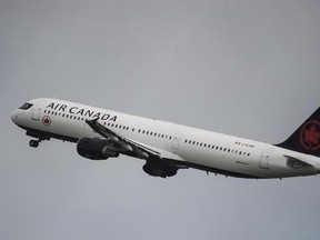 An Air Canada Airbus A321-211 is seen taking off from Pearson International Airport on Friday, July 28, 2017. Air Canada (TSX:AC) shares jumped almost 10 per cent Tuesday as the airline reported record second-quarter earnings and a well-received outlook. THE CANADIAN PRESS/Christopher Katsarov
