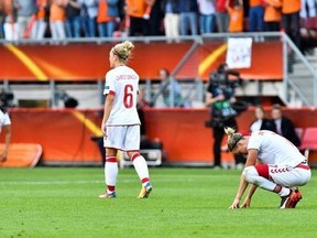 Players of Denmark reacts after the Netherlands score their side&#039;s fourth goal during the Women&#039;s Euro 2017 final soccer match between Netherlands and Denmark in Enschede, the Netherlands, Sunday, Aug. 6, 2017. (AP Photo/Patrick Post)