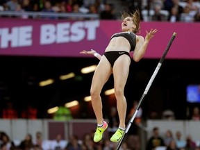 Canada&#039;s Alysha Newman celebrates during an attempt in the final of the women&#039;s pole vault during the World Athletics Championships in London Sunday, Aug. 6, 2017. (AP Photo/Matthias Schrader)