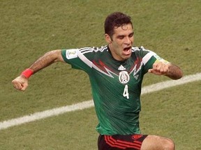 FILE - In this June 23, 2014 file photo, Mexico&#039;s Rafael Marquez celebrates scoring his side&#039;s first goal during the group A World Cup soccer match between Croatia and Mexico at the Arena Pernambuco in Recife, Brazil. The United States Treasury announced Wednesday, Aug. 9, 2017, that the legendary Mexican soccer player is among 22 people sanctioned for alleged ties to a drug trafficking organization. (AP Photo/Hassan Ammar, File)