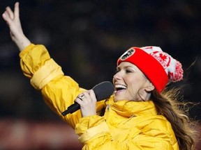 Canadian country singer Shania Twain waves to the crowd during her half time show at the Grey Cup football championship game Sunday, Nov. 24, 2002 in Edmonton. Country music superstar Shania Twain will be the halftime performer at this year&#039;s Grey Cup.The five-time Grammy Award winner from Timmins, Ont., has more than 90 million albums sold worldwide and U.S. sales topping $34.5 million, making her the top-selling female country artist of all time. THE CANADIAN PRESS/ Adrian Wyld