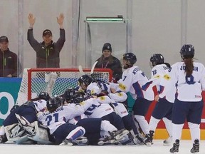 South Korean players celebrate after winning against the Netherlands during their IIHF Ice Hockey Women&#039;s World Championship Division II Group A game in Gangneung, South Korea, Saturday, April 8, 2017. THE CANADIAN PRESS/AP-Ahn Young-joon
