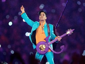 FILE - In this Feb. 4, 2007, file photo, Prince performs during the halftime show at the Super Bowl XLI football game at Dolphin Stadium in Miami. A rare Prince music film, &ampquot;Sign O&#039; the Times,&ampquot; will air on Showtime beginning Sept. 16. The film was created as an in-theater companion to his 1987 double album of the same name. (AP Photo/Chris O&#039;Meara, File)