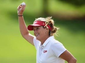 Canada&#039;s Lorie Kane celebrates after sinking a birdie putt on the 15th hole during first round action at the 2017 Canadian Pacific Women&#039;s Open in Ottawa on Thursday, Aug. 24, 2017. THE CANADIAN PRESS/Sean Kilpatrick