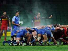 Steam rises from players in wet conditions during the Super Rugby match between Australias Western Force and South Africas Stormers in Perth on July 9, 2016.