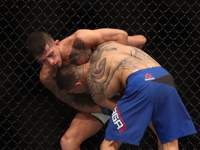 Sergio Pettis (left) fights John Moraga during the UFC Fight Night event at the at Talking Stick Resort Arena on January 15, 2017 in Phoenix, Arizona.