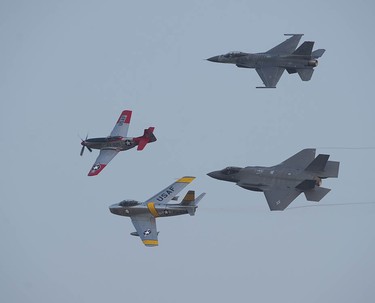 A U.S. Air Force heritage flight with a P-51, F-86, F-16 and F-35 performs at the Abbotsford Airshow.