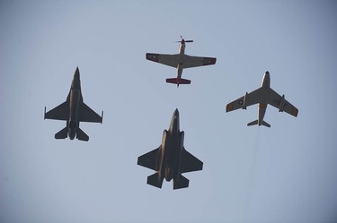 A U.S. Air Force heritage flight with a P-51, F-86, F-16 and F-35 performs at the Abbotsford Airshow.