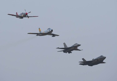 A U.S. Air Force heritage flight with a P-51, F-86, F-16 and F-35 performs at the Abbotsford Airshow.