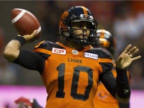 Jonathon Jennings look to pass against the Calgary Stampeders at B.C. Place during the team's scrappy 21-17 loss.