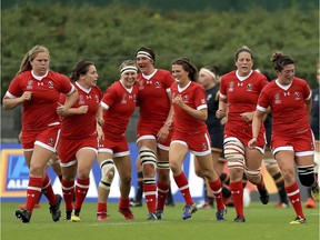 Canada players celebrate after scoring a try against Wales during the 2017 Women's World Cup, 5th Place Semi Final match at the Queen's University, Belfast, Northern Ireland, Tuesday, Aug. 22, 2017.