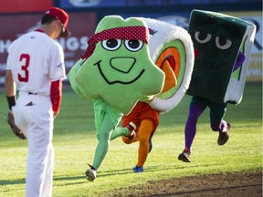 The Sushi race during a break as the Vancouver Canadians play the Tri-City Dust Devils at Nat Bailey Stadium last month.