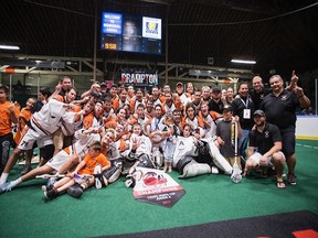 The Six Nations Arrows celebrate their Minto Cup victory Thursday in Brampton.