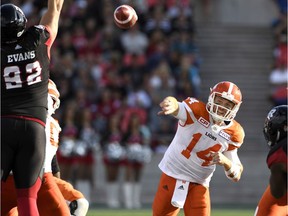 B.C. Lions quarterback Travis Lulay throws a pass against the Redblacks during the second half of a CFL game in Ottawa on Aug. 26.