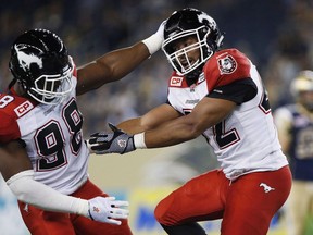 Calgary Stampeders' Deron Mayo (right) was Calgary's top tackler and defensive captain when he suffered a season-ending knee injury in 2016. After a long rehabilitation, the 29-year-old is expected to play his first game of 2017 on Friday in Vancouver against the B.C. Lions.