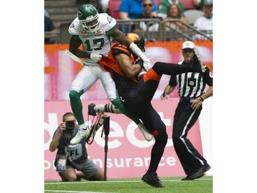 BC Lions #16 Bryan Burnham hauls in a pass covered by Saskatchewan Roughriders #17 Crezdon Butler in a regular season CHL football game at BC Place Vancouver, August 05 2017.