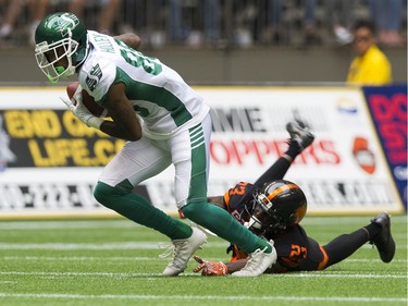 Saskatchewan Roughriders #88 Caleb Holley slips away from BC Lions #23 Anthony Gaitor in a regular season CHL football game at BC Place Vancouver, August 05 2017.
