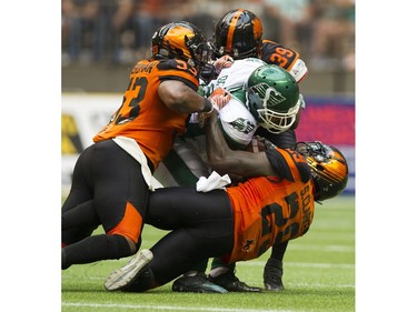 Saskatchewan Roughriders #9 Nic Demski is swarmed by BC Lions #29 Steven Clark, #39 Chandler Fenner and   #53 Jordan Herdman in a regular season CHL football game at BC Place Vancouver, August 05 2017.