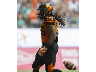 BC Lions #35 Shaquille Murray-Lawrence drops the ball in the end zone after a touchdown run against the Saskatchewan Roughriders in a regular season CHL football game at BC Place Vancouver, August 05 2017.