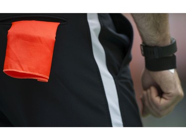 The flag in a pocket of an official as the BC Lions meet the Saskatchewan Roughriders in a regular season CHL football game at BC Place Vancouver, August 05 2017.
