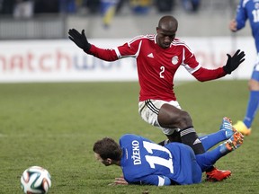 Aly Ghazal playing for Egypt in a 2014 friendly against Eden Dzeko and Bosnia and Herzegovina