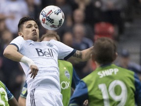 Fredy Montero, left, fighting for control of the ball with Seattle Sounders' Harry Shipp earlier this season.
