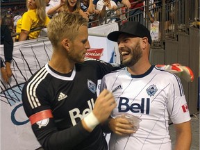 Whitecaps fan Steve Mousseau, right, got to meet goalie David Ousted after another fan punched him in the face. Mousseau was down at field level receiving first aid as the game on Saturday, Aug. 19, ended. Ousted asked him what had happened.