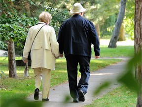 An elderly couple goes for a walk. Governments need to start investing in care navigators to ensure equitable access to publicly funded services and supports, advocates say.