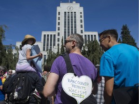 Thousands of people surrounded Vancouver city hall Saturday, Aug. 19, 2017, to attend a counter rally in protest of a planned anti-Muslim rally that was to take place there. Several scuffles took place but were dealt with by the VPD.