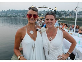 Dressed in their party whites, White Rock residents Lorie Parkinson and Bronwyn Muirhead were among 300 revellers lucky enough to snap up tickets to the Peace Arch Hospital Foundation's pop-up picnic on Semiahmoo Bay.