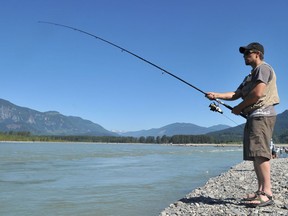 Steven Kendzierski fishes for salmon off the banks of the Fraser River in August 2010.