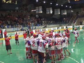 The New Westminster Salmonbellies celebrate winning the WLA final on Sunday at Queen's Park Arena.