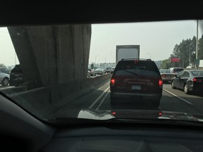 Province columnist Gordon Clark sits in traffic approaching George Massey Tunnel northbound during afternoon rush hour after arriving off ferry from Salt Spring Island. Seven or eight lanes of traffic must merge into one lane, leading to more than an hour-long delay.